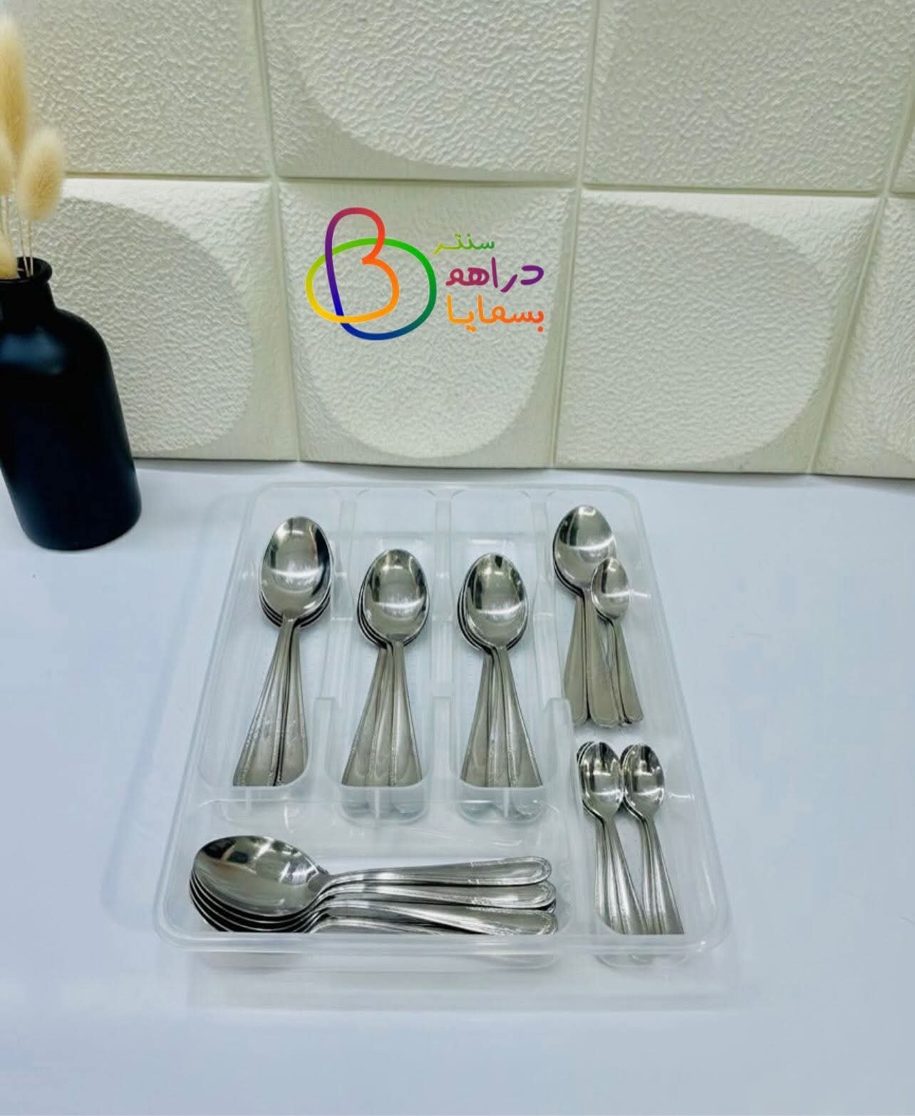 منظم ملاعق داخل مجر